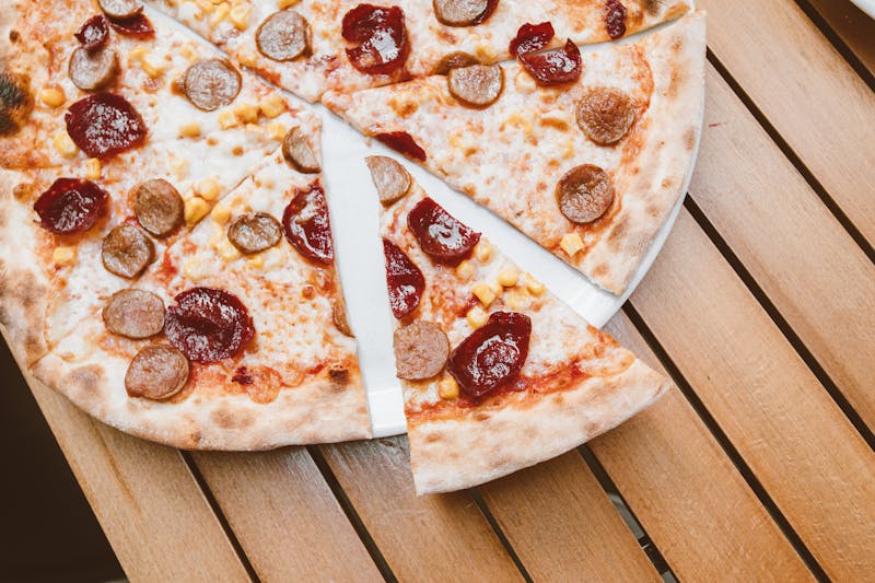 Spicy Italian sausage thin crust pizza