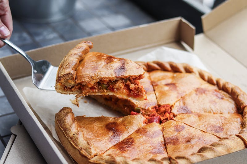 Sausage mushroom deep dish pizza
