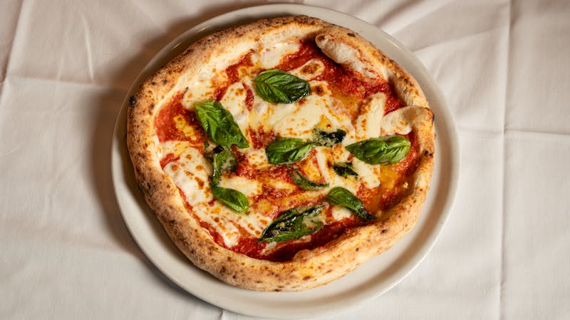 Margherita thin crust pizza fresh basil